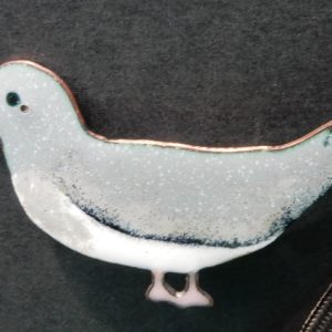 Alfinete em cobre, Cagarro